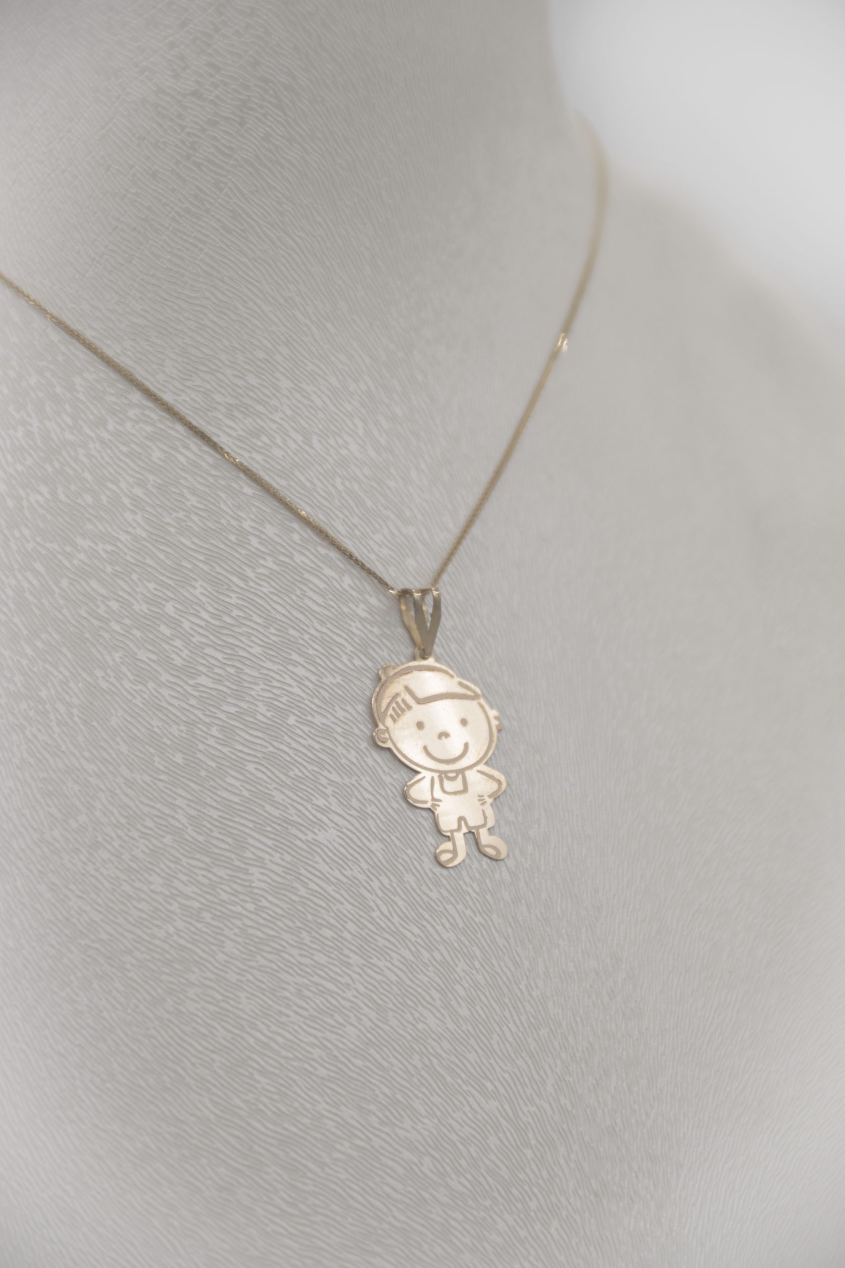 IMG_7148 copy آویز طلا لیزری طرح پسربچه - Image 1